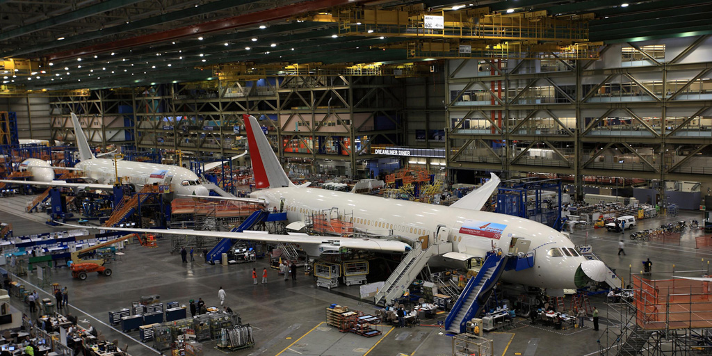 Inside Boeing's massive Everette facility - this building is so big, dozens of aircraft, from 777s to 747s can be built inside its massive expanse. I've been there - it's literally a city indoors. Over 30,000 people work inside it.